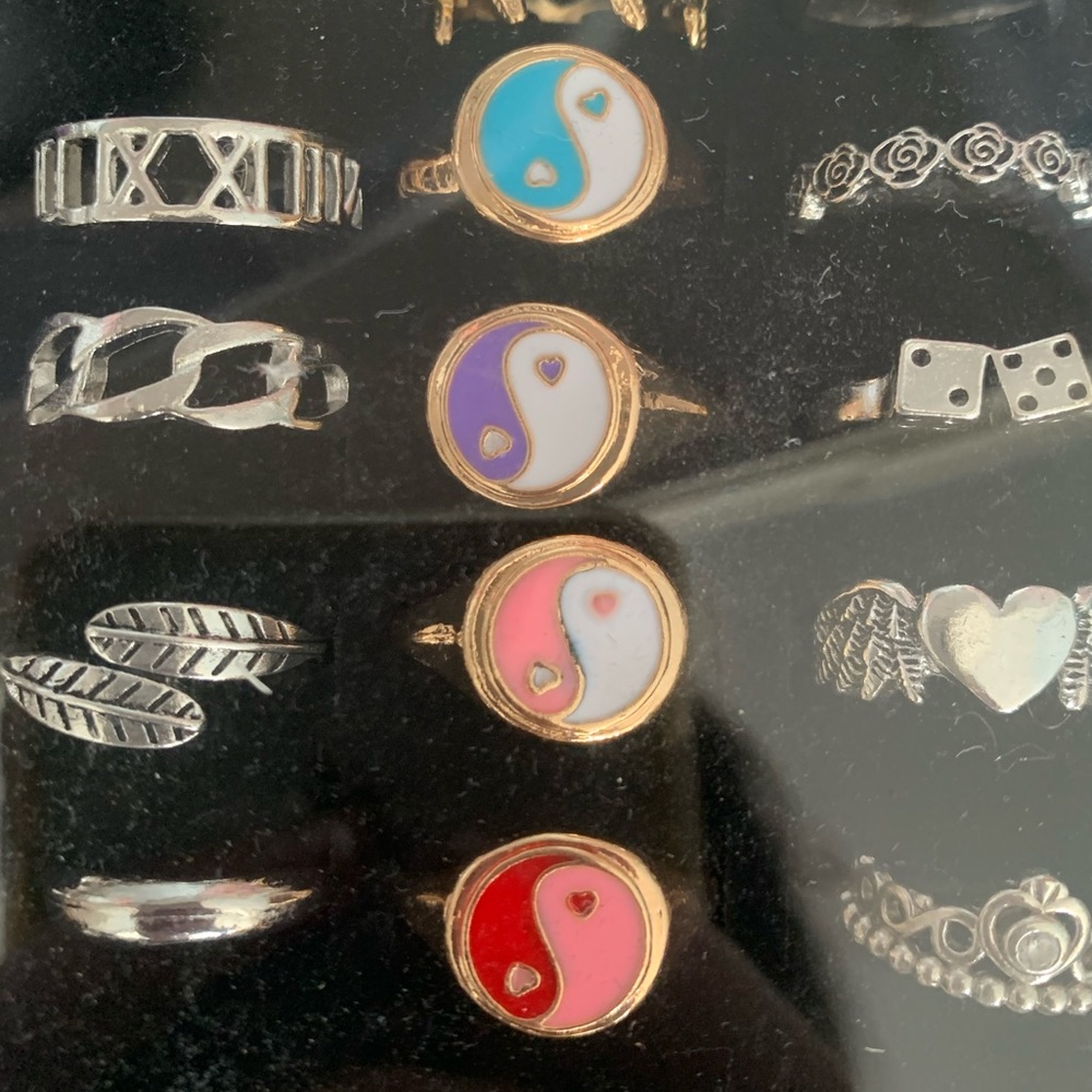 Gold coloured yin yang rings